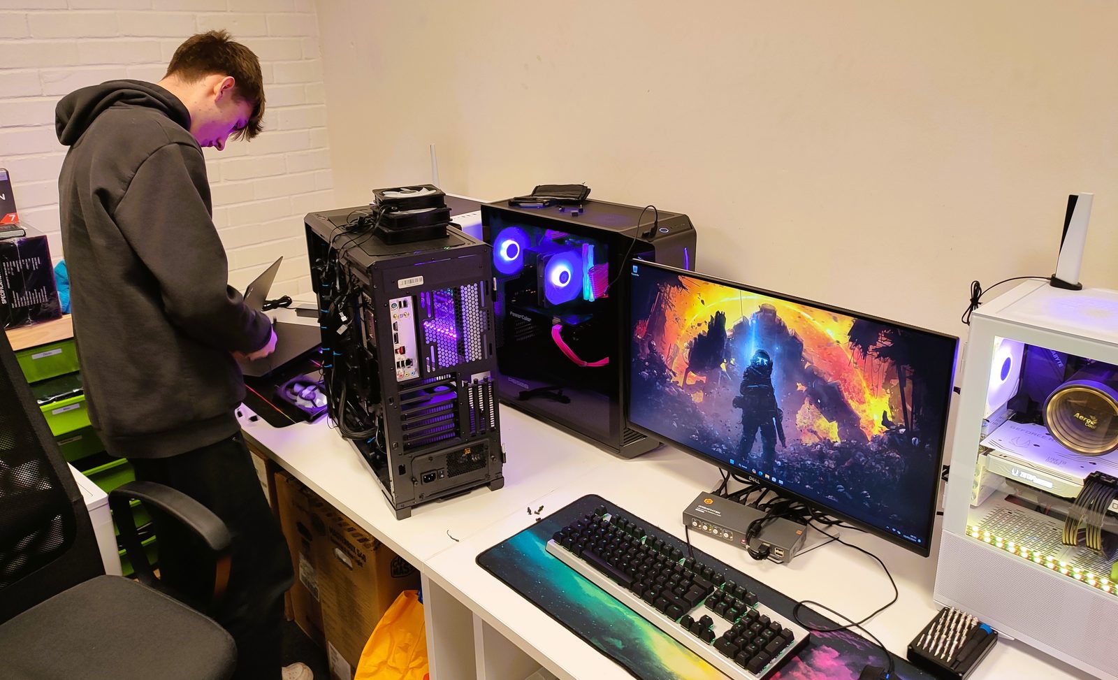 Technician working on custom builds in the workshop